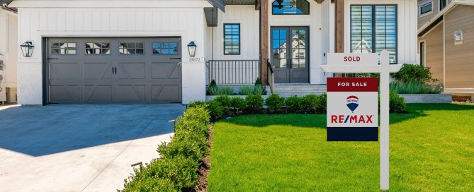 RE/MAX sign in a yard